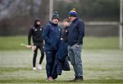 4 January 2025; Tipperary manager Liam Cahill, left, and Clare manager Brian Lohan in discussion before the Intercounty Hurling Challenge Match between Tipperary and Clare at Páirc Shilean in Templemore, Tipperary. Photo by David Fitzgerald/Sportsfile