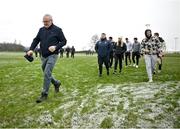 4 January 2025; Clare manager Brian Lohan leaves the pitch with players and staff before the Intercounty Hurling Challenge Match between Tipperary and Clare at Páirc Shilean in Templemore, Tipperary. Photo by David Fitzgerald/Sportsfile