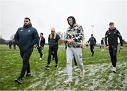 4 January 2025; Clare players and staff leave the pitch before the Intercounty Hurling Challenge Match between Tipperary and Clare at Páirc Shilean in Templemore, Tipperary. Photo by David Fitzgerald/Sportsfile