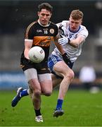 4 January 2025; Ronan Shanahan of Austin Stacks in action against Charlie Crozier of Ballinderry during the AIB GAA Football All-Ireland Intermediate Club Championship semi-final match between Austin Stacks and Ballinderry at Parnell Park in Dublin. Photo by Ben McShane/Sportsfile