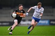 4 January 2025; Ronan Shanahan of Austin Stacks in action against Charlie Crozier of Ballinderry during the AIB GAA Football All-Ireland Intermediate Club Championship semi-final match between Austin Stacks and Ballinderry at Parnell Park in Dublin. Photo by Ben McShane/Sportsfile