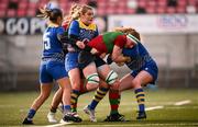 4 January 2025; Ruth Campbell of Clovers is tackled by Carys Williams-Morris and Caitlin Lewis of Gwalia Lightning during the Celtic Challenge match between Clovers and Gwalia Lightning at Kingspan Stadium in Belfast. Photo by Ramsey Cardy/Sportsfile