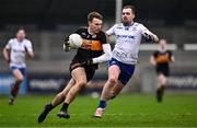 4 January 2025; Michael O'Donnell of Austin Stacks in action against Ryan Bell of Ballinderry during the AIB GAA Football All-Ireland Intermediate Club Championship semi-final match between Austin Stacks and Ballinderry at Parnell Park in Dublin. Photo by Ben McShane/Sportsfile