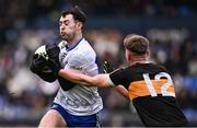 4 January 2025; Eoin Devlin of Ballinderry is tackled by Daniel Kirby of Austin Stacks during the AIB GAA Football All-Ireland Intermediate Club Championship semi-final match between Austin Stacks and Ballinderry at Parnell Park in Dublin. Photo by Ben McShane/Sportsfile