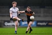 4 January 2025; Niall O'Donnell of Ballinderry in action against Armin Heinrich of Austin Stacks during the AIB GAA Football All-Ireland Intermediate Club Championship semi-final match between Austin Stacks and Ballinderry at Parnell Park in Dublin. Photo by Ben McShane/Sportsfile