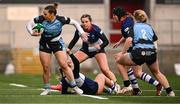 4 January 2025; Grace Deane of Glasgow Warriors is tackled by Erin McConnell of Wolfhounds during the Celtic Challenge match between Wolfhounds and Glasgow Warriors at Kingspan Stadium in Belfast. Photo by Ramsey Cardy/Sportsfile