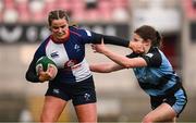 4 January 2025; Katie Corrigan of Wolfhounds is tackled by Sky Phimster of Glasgow Warriors during the Celtic Challenge match between Wolfhounds and Glasgow Warriors at Kingspan Stadium in Belfast. Photo by Ramsey Cardy/Sportsfile