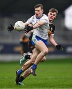 4 January 2025; Ruairi Forbes of Ballinderry in action against Daniel Kirby of Austin Stacks during the AIB GAA Football All-Ireland Intermediate Club Championship semi-final match between Austin Stacks and Ballinderry at Parnell Park in Dublin. Photo by Ben McShane/Sportsfile