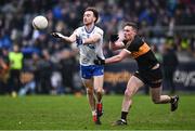 4 January 2025; Conor O'Neill of Ballinderry in action against Greg Horan of Austin Stacks during the AIB GAA Football All-Ireland Intermediate Club Championship semi-final match between Austin Stacks and Ballinderry at Parnell Park in Dublin. Photo by Ben McShane/Sportsfile