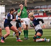 4 January 2025; Erin King of Wolfhounds celebrates with Katie Corrigan, left, after scoring their side's fourth try during the Celtic Challenge match between Wolfhounds and Glasgow Warriors at Kingspan Stadium in Belfast. Photo by Ramsey Cardy/Sportsfile