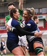 4 January 2025; Erin King of Wolfhounds celebrates with Katie Corrigan, left, after scoring their side's fourth try during the Celtic Challenge match between Wolfhounds and Glasgow Warriors at Kingspan Stadium in Belfast. Photo by Ramsey Cardy/Sportsfile