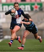 4 January 2025; Katie Corrigan of Wolfhounds evades the tackle of Sky Phimster of Glasgow Warriors during the Celtic Challenge match between Wolfhounds and Glasgow Warriors at Kingspan Stadium in Belfast. Photo by Ramsey Cardy/Sportsfile