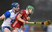 4 January 2025; Ben Cunningham of Cork is tackled by Sam Fitzgerald of Waterford during the Intercounty Hurling Challenge Match between Waterford and Cork at Fraher Field in Dungarvan, Waterford. Photo by Seb Daly/Sportsfile