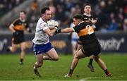 4 January 2025; Ryan O'Neill of Ballinderry is tackled by Colin Griffin of Austin Stacks during the AIB GAA Football All-Ireland Intermediate Club Championship semi-final match between Austin Stacks and Ballinderry at Parnell Park in Dublin. Photo by Ben McShane/Sportsfile