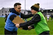 4 January 2025; Ballinderry manager Jarlath Bell, left, shakes hands with Austin Stacks manager Billy Lee after the AIB GAA Football All-Ireland Intermediate Club Championship semi-final match between Austin Stacks and Ballinderry at Parnell Park in Dublin. Photo by Ben McShane/Sportsfile