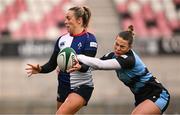 4 January 2025; Stacey Flood of Wolfhounds is tackled by Grace Deane of Glasgow Warriors during the Celtic Challenge match between Wolfhounds and Glasgow Warriors at Kingspan Stadium in Belfast. Photo by Ramsey Cardy/Sportsfile