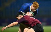 4 January 2025; Ruben Moloney of Leinster is tackled by Gene O'Leary Kareem of Ireland during the friendly match between Ireland U20 and Leinster Development XV at Energia Park in Dublin. Photo by Ben McShane/Sportsfile