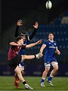 4 January 2025; Sam Wisniewski of Ireland in action against Conor O'Tighernaigh of Leinster during the friendly match between Ireland U20 and Leinster Development XV at Energia Park in Dublin. Photo by Ben McShane/Sportsfile