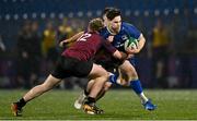 4 January 2025; Paidi Farrell of Leinster is tackled by Paddy Taylor of Ireland during the friendly match between Ireland U20 and Leinster Development XV at Energia Park in Dublin. Photo by Ben McShane/Sportsfile