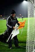 4 January 2025; Groundsman, and former intercounty referee, Fintan Barrett, from Two Mile House, with the white flag for a traditional point and the orange flag, for an arc two-pointer, as he prepares the goals before the Intercounty Football Challenge match between Kildare and Galway at Cedral St Conleth's Park in Newbridge, Kildare. Photo by Piaras Ó Mídheach/Sportsfile