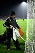 4 January 2025; Groundsman, and former intercounty referee, Fintan Barrett, from Two Mile House, with the white flag for a traditional point and the orange flag, for an arc two-pointer, as he prepares the goals before the Intercounty Football Challenge match between Kildare and Galway at Cedral St Conleth's Park in Newbridge, Kildare. Photo by Piaras Ó Mídheach/Sportsfile