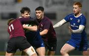 4 January 2025; Paidi Farrell of Leinster is tackled by Ireland players Ciaran Mangan, left, and Gene O'Leary Kareem during the friendly match between Ireland U20 and Leinster Development XV at Energia Park in Dublin. Photo by Ben McShane/Sportsfile