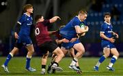 4 January 2025; Connor Fahy of Leinster is tackled by Sam Wisniewski of Ireland during the friendly match between Ireland U20 and Leinster Development XV at Energia Park in Dublin. Photo by Ben McShane/Sportsfile