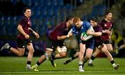 4 January 2025; Ruben Moloney of Leinster is tackled by Ireland players Aaron O'Brien, left, and Daniel Green during the friendly match between Ireland U20 and Leinster Development XV at Energia Park in Dublin. Photo by Ben McShane/Sportsfile