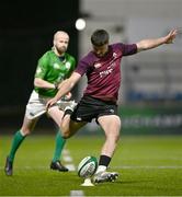 4 January 2025; Dylan Hicks of Ireland kicks a conversion during the friendly match between Ireland U20 and Leinster Development XV at Energia Park in Dublin. Photo by Ben McShane/Sportsfile