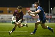 4 January 2025; Will Wootton of Ireland on his way to scoring a try despite the efforts of Andy Doyle of Leinster during the friendly match between Ireland U20 and Leinster Development XV at Energia Park in Dublin. Photo by Ben McShane/Sportsfile