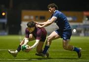 4 January 2025; Will Wootton of Ireland scores a try despite the efforts of Andy Doyle of Leinster during the friendly match between Ireland U20 and Leinster Development XV at Energia Park in Dublin. Photo by Ben McShane/Sportsfile