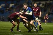 4 January 2025; Conor O'Shaughnessy of Leinster is tackled by Paddy Taylor of Ireland during the friendly match between Ireland U20 and Leinster Development XV at Energia Park in Dublin. Photo by Ben McShane/Sportsfile