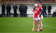 4 January 2025; Cork players Luke Meade, left, and Ethan Twomey stand for the playing of Amhrán na bhFiann before the Intercounty Hurling Challenge Match between Waterford and Cork at Fraher Field in Dungarvan, Waterford. Photo by Seb Daly/Sportsfile