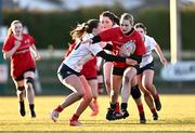 2 January 2025; Cliodhna Hanniffy of North East is tackled by Grainne Cleary of Midlands during the BearingPoint Sarah Robinson Cup Round 3 match between Midlands and North East at Shay Murtagh Park in Mullingar, Westmeath. Photo by Ben McShane/Sportsfile