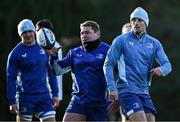 7 January 2025; Tadhg Furlong, centre, and Ross Byrne, right, during a Leinster Rugby squad training session at UCD in Dublin. Photo by Sam Barnes/Sportsfile