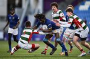 7 January 2025; Leke Mogaji of Wilson's Hospital gets past the tackle of George Priestley of St Columba’s College during the Bank of Ireland Leinster Rugby Boys Schools Vinnie Murray Cup 1st Round match between St Columba’s College and Wilson’s Hospital School at Energia Park in Dublin. Photo by Ben McShane/Sportsfile