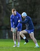 7 January 2025; Ciarán Frawley, left, and Jordan Larmour during a Leinster Rugby squad training session at UCD in Dublin. Photo by Sam Barnes/Sportsfile