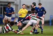 7 January 2025; Yaw Appaih of Wilson's Hospital is tackled by Arthur Morphew, left, and Rory O'Dowd of St Columba’s College during the Bank of Ireland Leinster Rugby Boys Schools Vinnie Murray Cup 1st Round match between St Columba’s College and Wilson’s Hospital School at Energia Park in Dublin. Photo by Ben McShane/Sportsfile