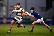 7 January 2025; David Cron of St Columba’s College evades the tackle of Jack Wheeler of Wilson's Hospital during the Bank of Ireland Leinster Rugby Boys Schools Vinnie Murray Cup 1st Round match between St Columba’s College and Wilson’s Hospital School at Energia Park in Dublin. Photo by Ben McShane/Sportsfile