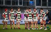 7 January 2025; St Columba’s College players look on as teammate George Priestley, right, receives medical attention during the Bank of Ireland Leinster Rugby Boys Schools Vinnie Murray Cup 1st Round match between St Columba’s College and Wilson’s Hospital School at Energia Park in Dublin. Photo by Ben McShane/Sportsfile