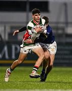 7 January 2025; Gustav Schierstadt of St Columba’s College is tackled by Joel Gyasi of Wilson's Hospital during the Bank of Ireland Leinster Rugby Boys Schools Vinnie Murray Cup 1st Round match between St Columba’s College and Wilson’s Hospital School at Energia Park in Dublin. Photo by Ben McShane/Sportsfile