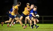 10 January 2025; Donagh O'Sullivan of MTU Kerry in action against Greg McEnaney of DCU Dóchas Éireann during the Electric Ireland Higher Education GAA Sigerson Cup Round 1 match between DCU Dóchas Éireann and MTU Kerry at DCU Sportsgrounds in Dublin. Photo by Piaras Ó Mídheach/Sportsfile