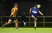 10 January 2025; Eddie Healy of MTU Kerry shoots under pressure from Greg McEnaney of DCU Dóchas Éireann during the Electric Ireland Higher Education GAA Sigerson Cup Round 1 match between DCU Dóchas Éireann and MTU Kerry at DCU Sportsgrounds in Dublin. Photo by Piaras Ó Mídheach/Sportsfile