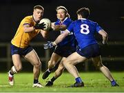 10 January 2025; Greg McEnaney of DCU Dóchas Éireann in action against Donagh Buckley and Eddie Healy, 8, of MTU Kerry during the Electric Ireland Higher Education GAA Sigerson Cup Round 1 match between DCU Dóchas Éireann and MTU Kerry at DCU Sportsgrounds in Dublin. Photo by Piaras Ó Mídheach/Sportsfile