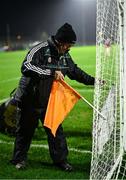 4 January 2025; Groundsman, and former intercounty referee, Fintan Barrett, from Two Mile House, with the orange flag, for an arc two-pointer, as he prepares the goals before the Intercounty Football Challenge match between Kildare and Galway at Cedral St Conleth's Park in Newbridge, Kildare. Photo by Piaras Ó Mídheach/Sportsfile