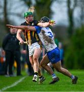 11 January 2025; Martin Keoghan of Kilkenny is tackled by Mark Fitzgerald of Waterford during the Intercounty Hurling Challenge Match between Kilkenny and Waterford at Piltown GAA Club in Kilkenny. Photo by Tyler Miller/Sportsfile