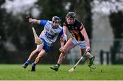 11 January 2025; Jamie Barron of Waterford in action against Gearóid Dunne of Kilkenny during the Intercounty Hurling Challenge Match between Kilkenny and Waterford at Piltown GAA Club in Kilkenny. Photo by Tyler Miller/Sportsfile