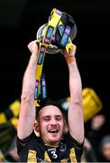 12 January 2025; St Lachtain's captain Criomhthann Bergin lifts the cup after his side's victory in the AIB GAA Hurling All-Ireland Junior Club Championship final match between St Lachtain's of Kilkenny and Russell Rovers of Cork at Croke Park in Dublin. Photo by Piaras Ó Mídheach/Sportsfile