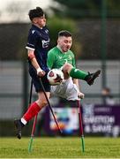 18 January 2025; Neil Hoey of Republic of Ireland in action against Connor Elliot of Scotland during the Amputee Football International Friendly match between Republic of Ireland and Scotland at Rock Celtic FC in Dundalk, Louth. Photo by Ben McShane/Sportsfile