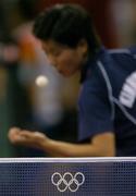 22 August 2004; Kim Hyang Mi, Peoples Republic of Korea, serves to her opponent. Women's Singles Table Tennis Final, Zhang Yining, China v Kim Hyang Mi, Peoples Republic of Korea. Galatsi Indoor Hall. Games of the XXVIII Olympiad, Athens Summer Olympics Games 2004, Athens, Greece. Picture credit; Brendan Moran / SPORTSFILE